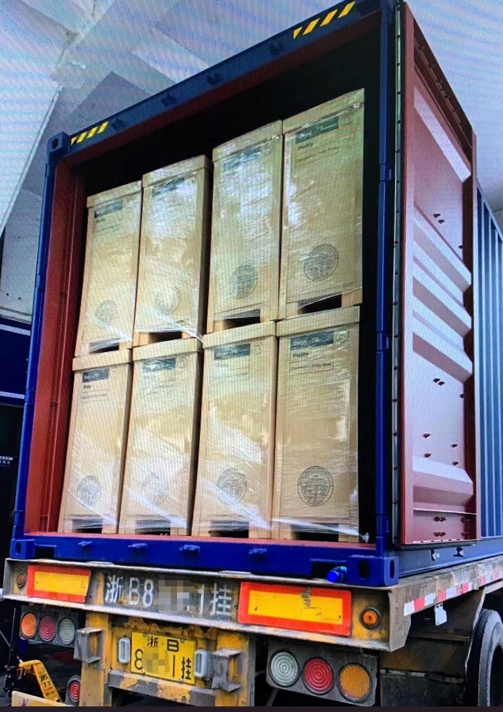 Container loaded, with cartons of displays, of products inside, ready for shipping.